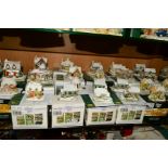 TWENTY ONE BOXED LILLIPUT LANE SCULPTURES FROM CHRISTMAS SNOWED AND SNOWED CHRISTMAS COLLECTIONS, to