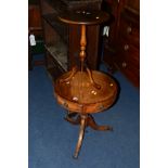 A REPRODUCTION MAHOGANY CIRCULAR DRUM TABLE and a wine table (2)