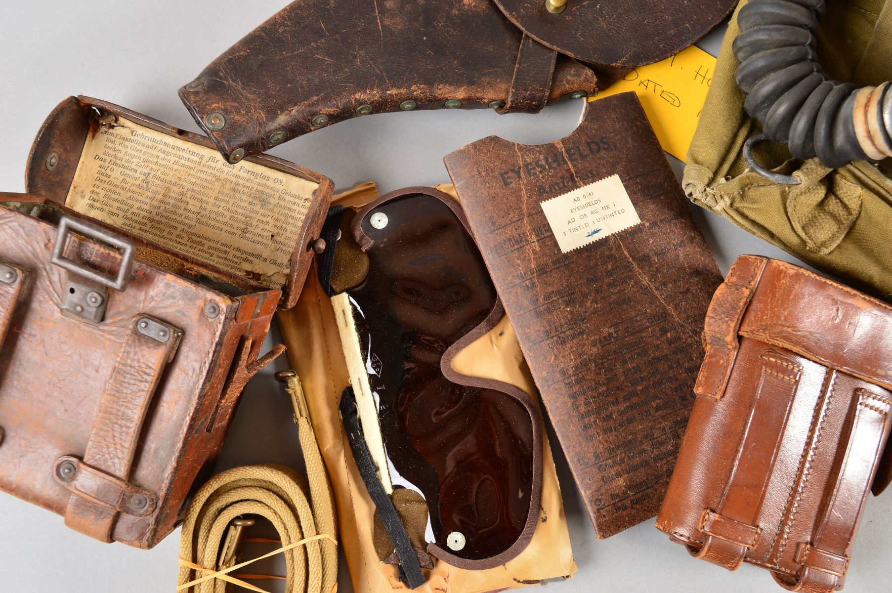 A BOX CONTAINING A WWII ERA BRITISH GAS MASK AND EYE SHIELDS, in green canvas bag, inside the - Image 2 of 3