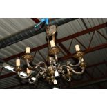 A METAL EIGHT BRANCH CHANDELIER together with a brass four branch ceiling light, two other ceiling