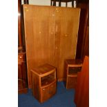 A TEAK TWO DOOR WARDROBE, matching dressing table and chest of drawers and a pair of walnut