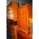 A TEAK DOUBLE SLIDING GLAZED BOOKCASE, an oak drop leaf table, yew wood two door TV cabinet and a hi