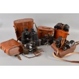 FIVE PAIRS OF MILITARY BINOCULARS, as follows, all cased, but not all matching, Bausch & Lomb, US