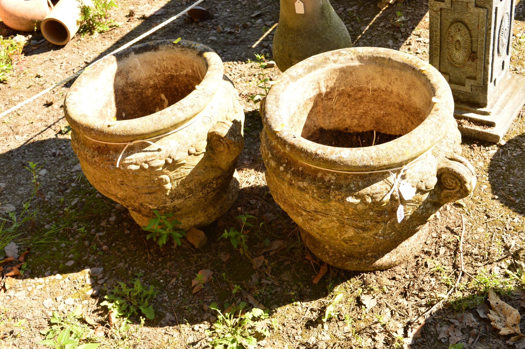 A PAIR OF COMPOSITE GREEK STYLE PLANTERS (2)
