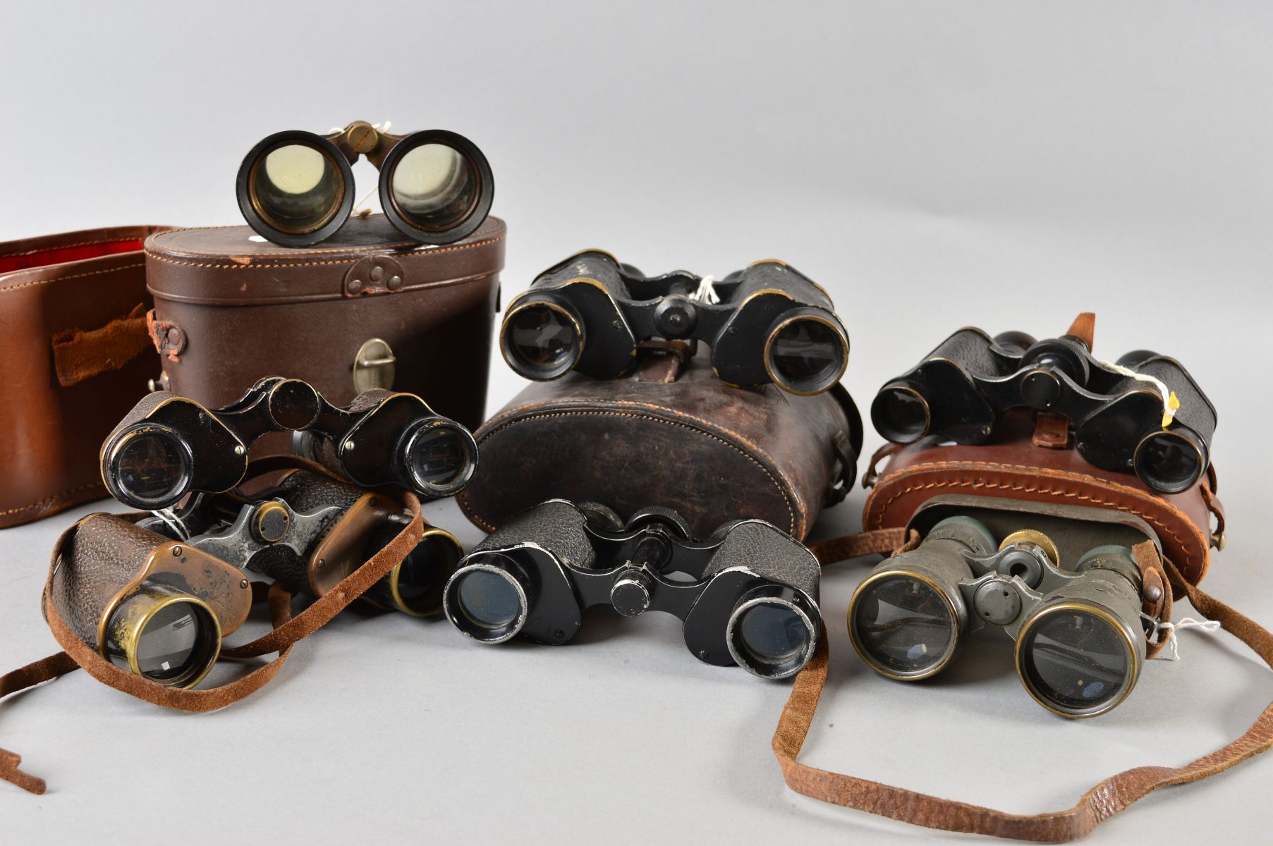 SEVEN PAIRS OF MILITARY BINOCULARS, some with leather cases, no all matching the optics, makers - Image 4 of 5