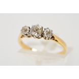 A THREE STONE DIAMOND RING designed as three graduated old cut diamonds within claw settings,