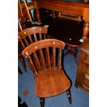 A MAHOGANY FOLD OVER PEDESTAL TABLE, together with six oak chairs including one carver (6)