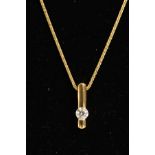 AN 18CT GOLD DIAMOND PENDANT NECKLACE, the pendant designed as a rounded bar set to the lower half