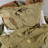 A LARGE PLASTIC STORAGE BIN CONTAINING SEVERAL ITEMS OF GENUINE MILITARIA, including camo shelter