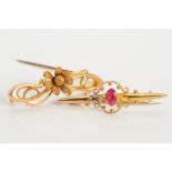TWO EARLY 20TH CENTURY GOLD BROOCHES, the first an tapered bar set with a central marquise shape