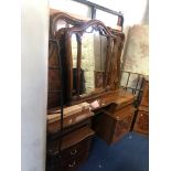 A REPRODUCTION ITALIAN BEDROOM SUITE comprising of a four door wardrobe (sd), dressing table and a