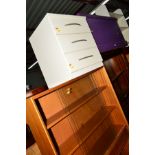 A PAINTED PINE TOOL CHEST, two teak sliding glass bookcases, painted open bookcase, bedside