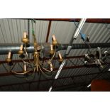 A LARGE BRASS NINE BRANCH CHANDELIER, together with an Art Deco style five branch ceiling light