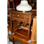 A CARVED OAK HALL TABLE with a single drawer on a stretchered base, width 65cm x depth 52cm x height