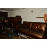 A BROWN LEATHER TWO PIECE LOUNGE SUITE, comprising a corner sofa, single armchair and two pouffe