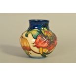 A SMALL MOORCROFT POTTERY VASE, 'Anna Lily' pattern, impressed marks and painted WM initials to
