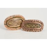 TWO LATE VICTORIAN MEMORIAL BROOCHES, both of elongated oval outline with a central woven hair