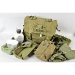 A LARGE DRAB OLIVE ARMY KIT BAG, containing a large number of canvas items including British issue