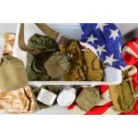 A LARGE PLASTIC STORAGE BIN CONTAINING VARIOUS GENUINE MILITARIA, as follows, large U.S 'Stars &