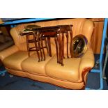 A MUSTARD LEATHER THREE SEATER SETTEE