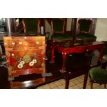 AN ORIENTAL RED GROUND SIDEBOARD with two drawers above double cupboard doors, width 91cm x depth