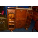 A 20TH CENTURY OAK SIDE BY SIDE BUREAU BOOKCASE (key)