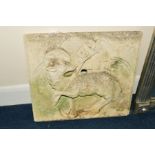 A RECONSTITUTED STONE ECCLESASTICAL PANEL OF THE HOLY LAMB CARRYING CROSS AND BANNER with a