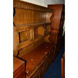 AN OLD CHARM OAK DRESSER with three drawers together with a similar drinks cabinet and a hi fi