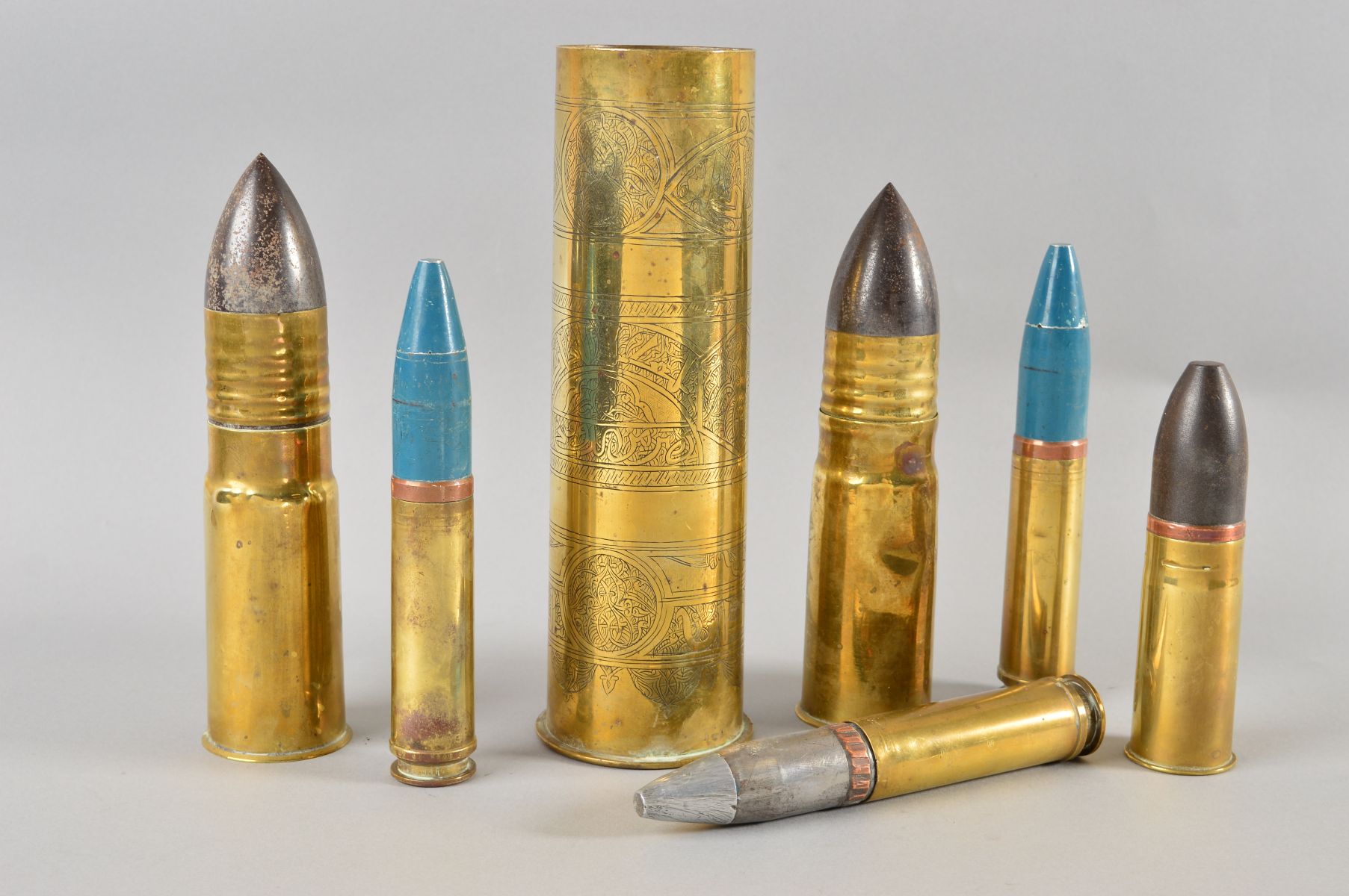 A BOX CONTAINING SIX MILITARY SHELLS OF VARIOUS CALIBRES INERT, and a larger shell which has been - Image 2 of 3