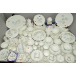 A WEDGWOOD 'ICE ROSE' PATTERN DINNER SERVICE, mainly for six and eight place settings, includes