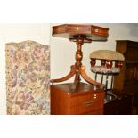 A BEVAN FUNNELL REPRODUX MAHOGANY OCTAGONAL DRUM TABLE, with a green tooled leather inlay top,