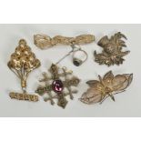 A SELECTION OF WHITE METAL JEWELLERY, to include a large filigree butterfly brooch, a thistle