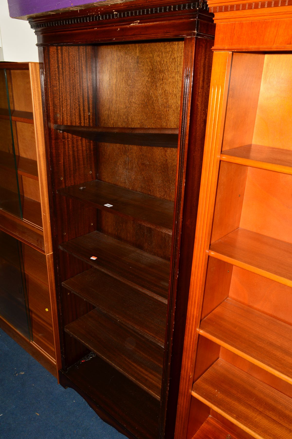 A MODERN MAHOGANY OPEN BOOKCASE, height 181cm