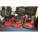 TWO CHAMPION LAWNMOWERS, together with a Sovereign lawn mower, all including grass boxes (3)