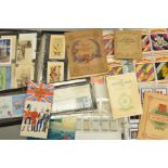 A QUANTITY OF POSTCARDS, CIGARETTE CARDS AND FIRST DAY COVERS ON A MILITARY THEME, to include WWI