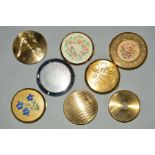 EIGHT VINTAGE COMPACTS, to include four Stratton compacts, two with floral designs, a further