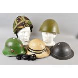 A BOX CONTAINING FIVE MILITARY HELMETS, as follows, Post War WWII era Eastern Block helmet, green