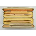 TWO CASED YARD-O-LED RETRACTABLE PENS, the first a 9ct gold engine turned case, with hallmark for