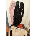 A COLLECTION OF COSTUME AND TEXTILES, including an early 20th Century black silk dress, pale pink/