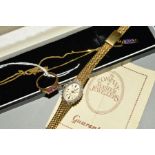 A DIAMOND SET LADY'S WRIST WATCH AND A 9CT GOLD AMETHYST PENDANT NECKLACE WITH MATCHING RING, the