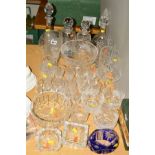 A GROUP OF CUT GLASS etc to include four decanters, vases, bowls and drinking glasses etc