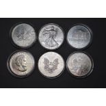 TWO USA 1OZ FINE SILVER ONE DOLLAR COINS, 2012, two Canadian fine silver 1oz 5 dollars, 2011, and