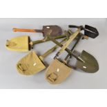 A LARGE BOX CONTAINING FOUR US ISSUE WWII ERA TRENCH SHOVELS, three with canvas cases attached, also