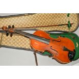 A 20TH CENTURY VIOLIN, two piece back, no label, together with a bow and in an earlier case