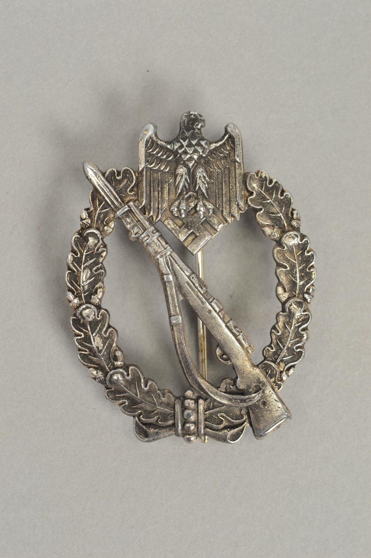 A WWII GERMAN 3RD REICH 'INFANTERIE STURMABZEICHEN' INFANTRY ASSAULT BADGE, this example in silver