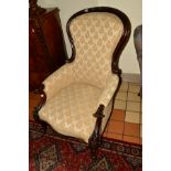 A VICTORIAN ROSEWOOD SPOONBACK CHAIR, covered in gold upholstery, foliate and scrolled decoration