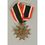 A GERMAN WWII WAR MERIT CROSS WITH SWORDS