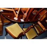 A MAHOGANY TWIN PEDESTAL TABLE, six matching chairs including two carvers and four other modern