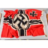 A WWII ISSUE 3RD REICH KRIEGSMARINE BATTLE FLAG, approximately 165cm x 90cm, the flag has the