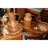 A COPPER TWIN HANDLED URN AND BOWL together with a copper water jug and a bowl (4)